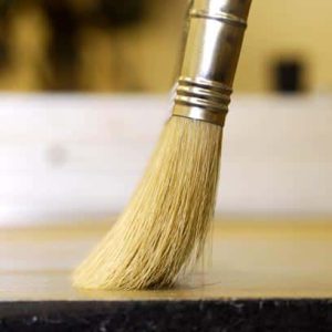 applying varnish thin varnish gentle brush stroke